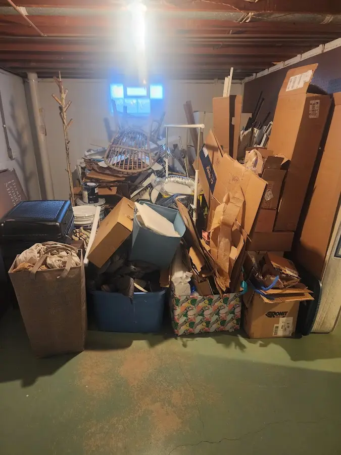 Roll-off dumpster container at job site for 4 Yard Dumpster Rental in Canton